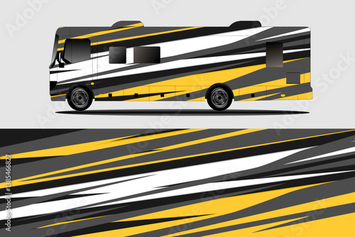 Stylishly designed recreational vehicle with dynamic yellow and black stripes on a gray background