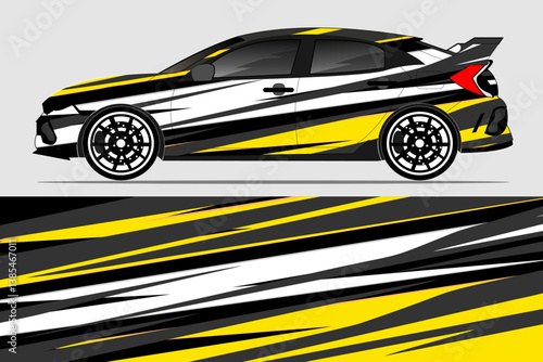 Stylishly designed race car with bold yellow and black graphics parked on a smooth surface