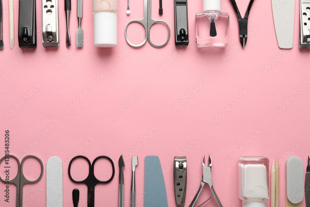 Frame of different manicure tools on pink background, flat lay. Space for text