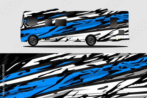 Stylishly designed RV with bold blue and black abstract patterns against a neutral background, showcasing modern vehicle aesthetics