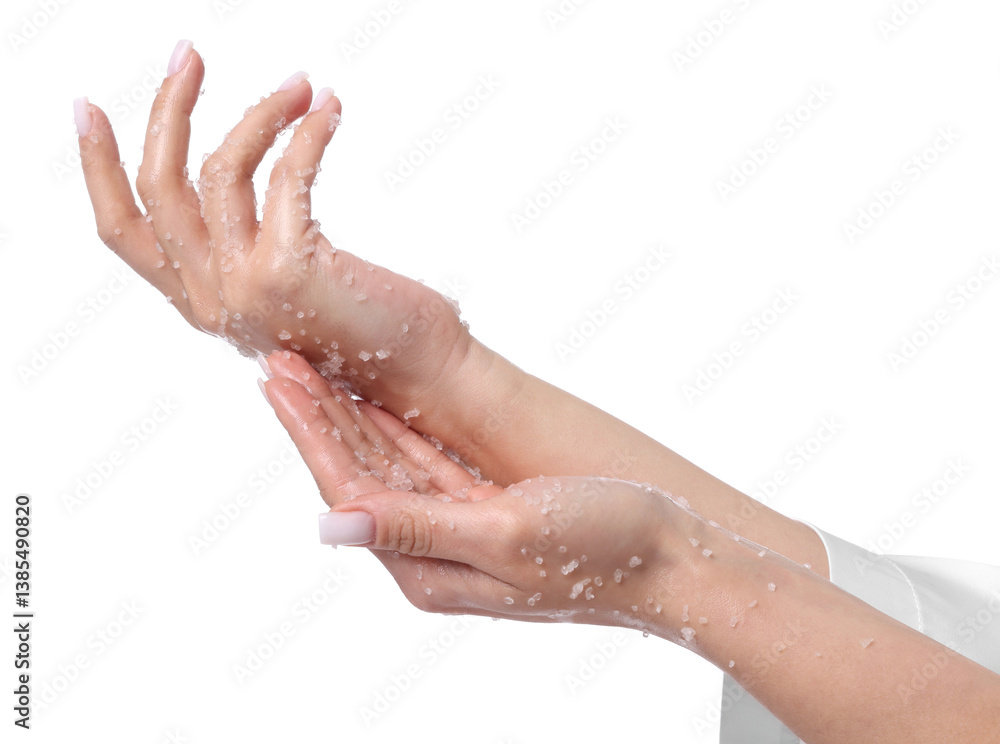 Woman applying body scrub onto her hands on white background, closeup