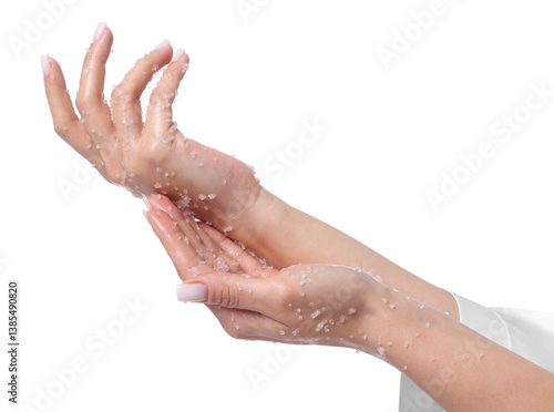 Woman applying body scrub onto her hands on white background, closeup