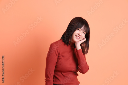 20s woman in red long sleeve t-shirt