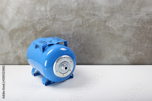 Water supply and sewerage - Blue hydraulic accumulator. Top view, front and side