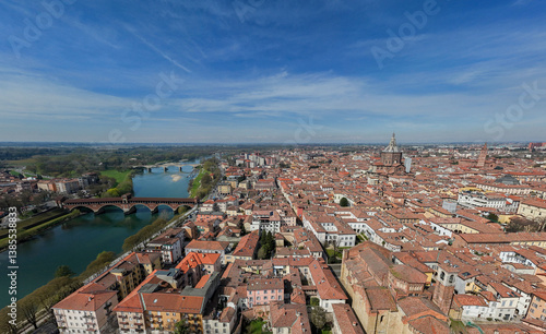 Obraz na płótnie Aerial view of Pavia and the Ticino River. View of the Cathedral of Pavia, Covered Bridge and the Visconti Castle. Lombardia, Italy
w salonie