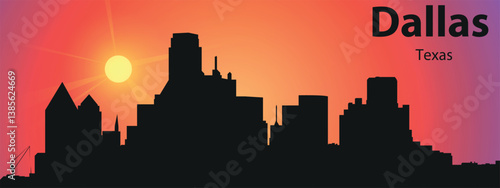 The black silhouette of the city of Dallas, Texas against the backdrop of a picturesque sunset	