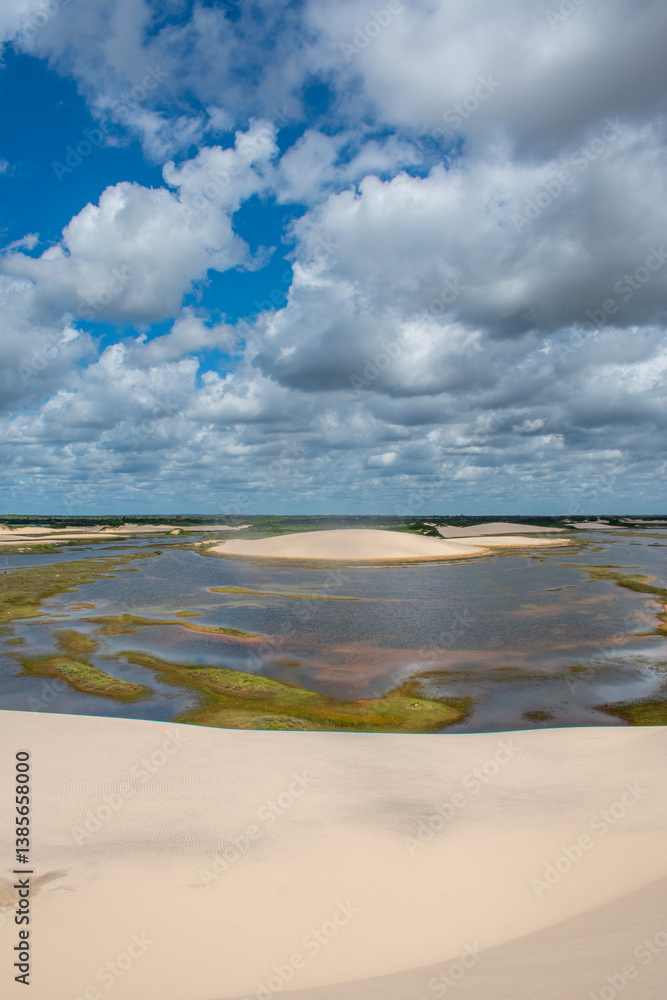 Barreirinhas, Maranhao State National Park, Brazil: view of Lencois Maranhenses, white and rolling sand dunes with natural pools of fresh water, desert landscape, green and reflections