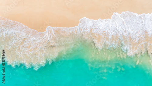 Fototapeta Naklejka Na Ścianę i Meble -  Crystal clear turquoise sea at a white sand beach in paradise. summer background and summer holiday concept.