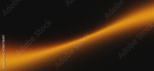 Abstract orange glow on black background.