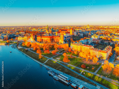 Wawel castle landmark with city view near river in Krakow Poland.   Autumn landscape on coast river Wisla.