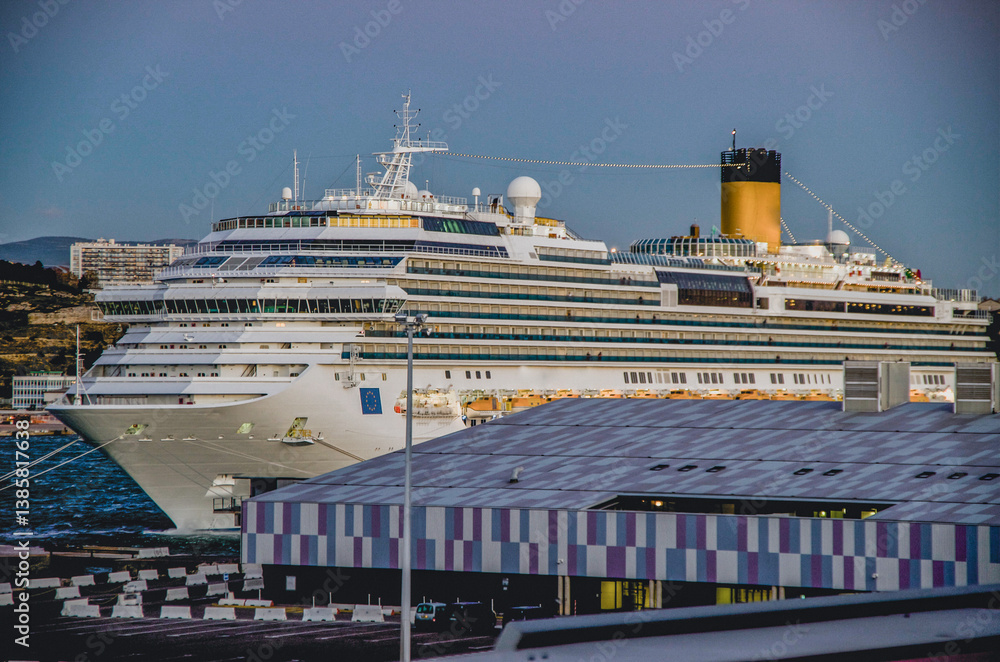 Family cruiseship or cruise ship Favolosa in Marseille Provence, France port on windy summer day blue sky during Mediterranean cruising dream vacation