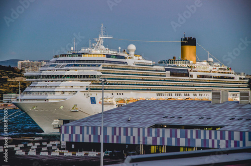Obraz na płótnie Family cruiseship or cruise ship Favolosa in Marseille Provence, France port on windy summer day blue sky during Mediterranean cruising dream vacation w salonie