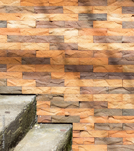 Obraz na płótnie Close-up of textured stone tiles in warm earthy tones at a Medellín, Medellin street, Antioquia, Colombia. Highlighting intricate patterns and natural contrasts with a rustic charm w salonie
