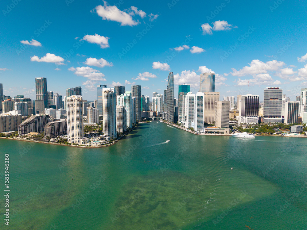 Fototapeta premium Miami city skyline view of Brickell key. Miami downtown. Skyscraper building. Cityscape building downtown. City architecture. Miami downtown skyline. Miami skyscraper cityscape