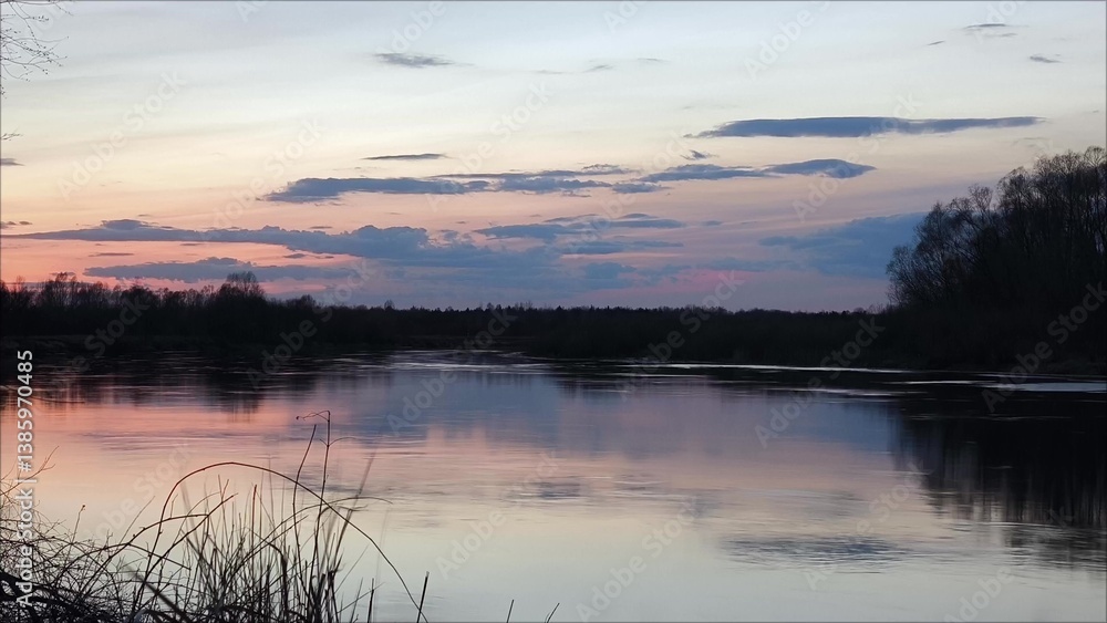 Mystical sunset over the river. Beautiful sunset sky. Nature background. purple sunset over the lake Mystical sunset over the river. Beautiful sunset sky. Nature background. purple sunset over the lake