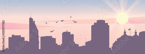 The silhouette of the city against the backdrop of the sunset and pink clouds. It is also made in pastel colors