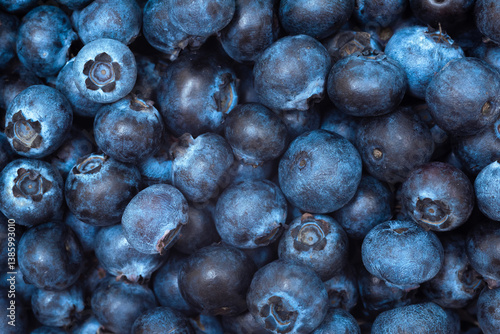 Close-up of blueberries on dark background. Fresh blueberries. Fresh blueberry background.