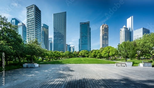 modern city park with lush greenery and towering skyscrapers under a bright blue sky