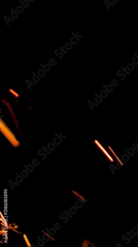 Sparks flying from a fire or welding