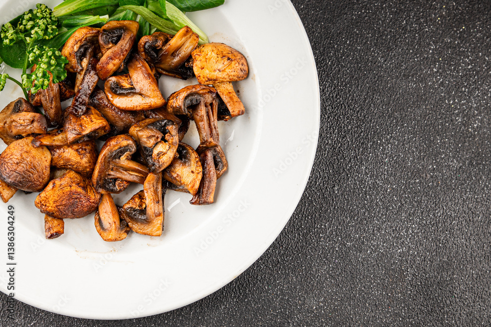 Mushroom fried champignon dish fresh gourmet food background on the table rustic food top view copy space vegetarian and vegan food