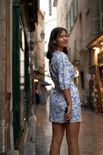 Obraz na płótnie Beautiful young mixed race woman in the old town of Nice, France w salonie