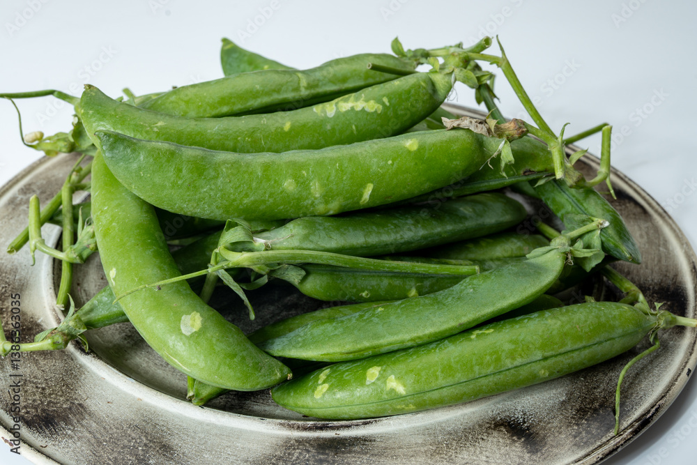 New harvest of fresh ripe green peas legumes New harvest of fresh ripe green peas legumes