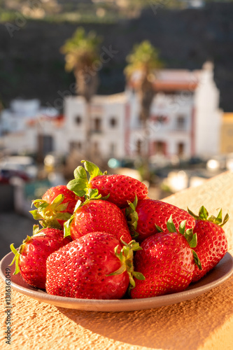 New harvest, plate with bio ripe red sweet strawberry from Tenerife, Canary islands, Spain, vegetarian food local grown fruits