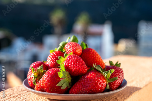 New harvest, plate with bio ripe red sweet strawberry from Tenerife, Canary islands, Spain, vegetarian food local grown fruits