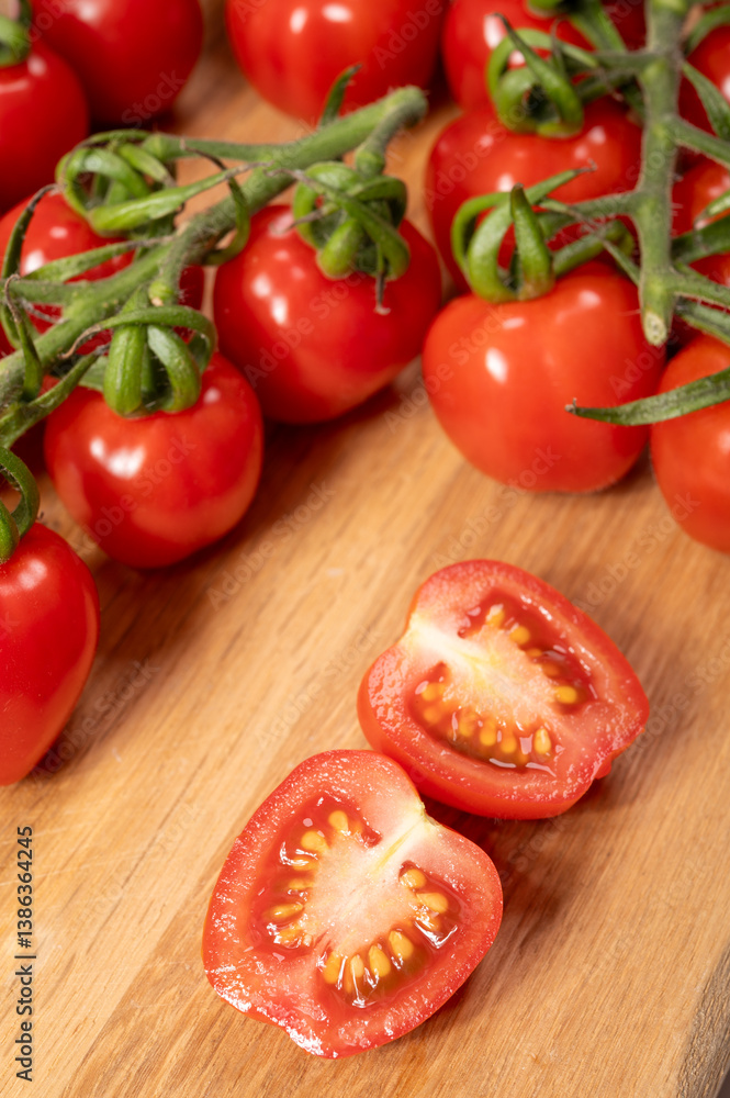 ed sweet ripe tasty Dutch tomatoes growing indoor in greenhouse all seasons, food industry in Netherlands close up ed sweet ripe tasty Dutch tomatoes growing indoor in greenhouse all seasons, food industry in Netherlands close up
