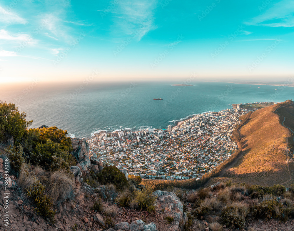 Fototapeta premium Cape Town overlooking Sea Point - majestic Table Mountain Landscape panorama taken from the top of Lions Head - South Africa best travel destination for nature and adventure