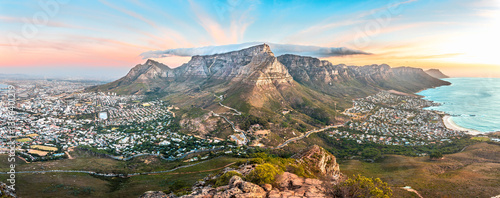 Cape Town, Stunning sunset with Table Mountain Landscape taken from the top of Lions Head - South Africa best travel destination for nature and adventure