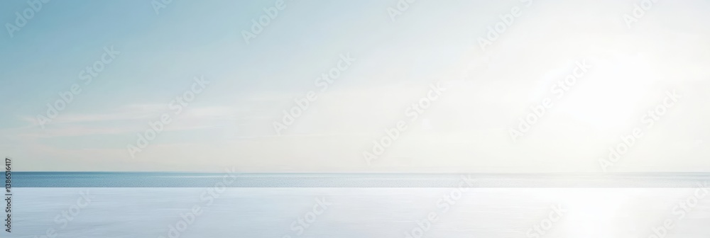 Fototapeta premium Serene coastal landscape at sunrise, showcasing a calm sea reflecting soft light with gentle waves, creating a peaceful atmosphere ideal for relaxation and mindfulness