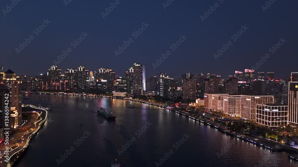 4K Real Time Aerial view of Shanghai skyline with winding river in downtown at night 4K Real Time Aerial view of Shanghai skyline with winding river in downtown at night
