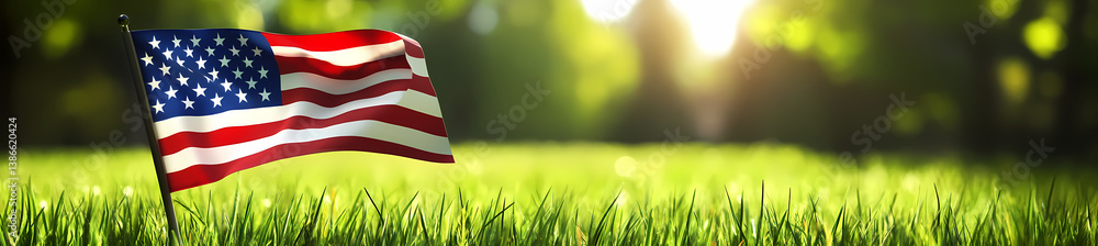 Fototapeta premium American Flag on Green Field: The American flag flutters proudly against a backdrop of lush green grass and a sun-drenched forest. The scene evokes a sense of patriotism, freedom, and natural beauty.