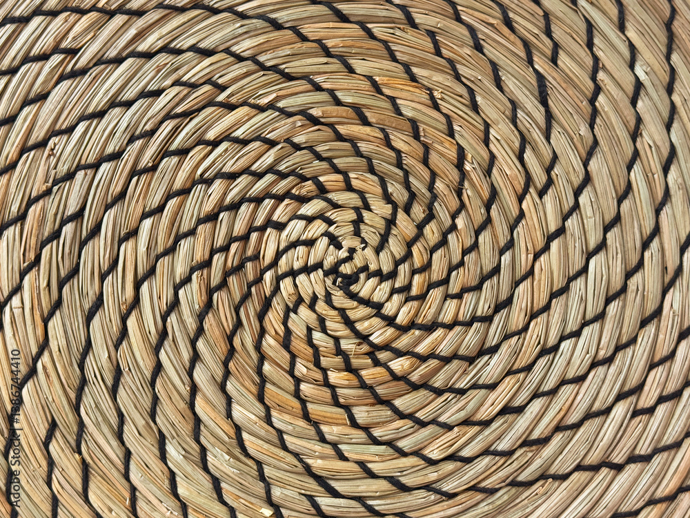 Random spiral rattan or wicker art and craft, round circle spiral synthetic rattan basket weave accessories or decoration on wall. Random spiral rattan or wicker art and craft, round circle spiral synthetic rattan basket weave accessories or decoration on wall.