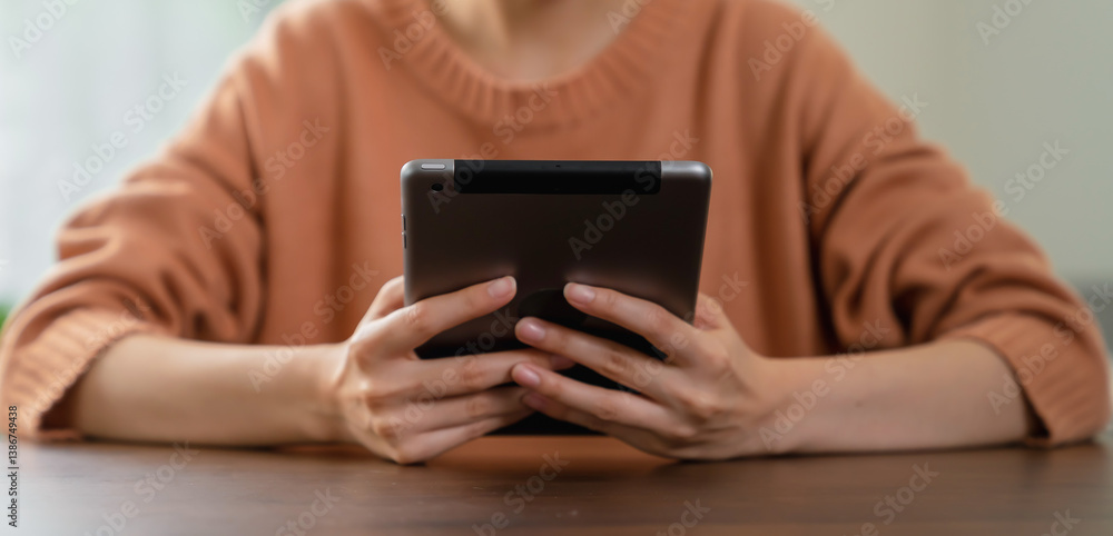 woman hand holding digital tablet and touching on screen. woman hand holding digital tablet and touching on screen.