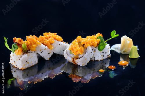 This image showcases a beautifully presented plate of sushi, likely a spicy roll variety. The sushi rolls are made with white rice on the outside, speckled with sesame seeds, and topped with a vibrant