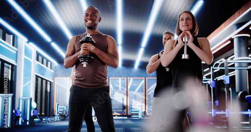 Obraz na płótnie Multiracial Training Team Squats Together w salonie