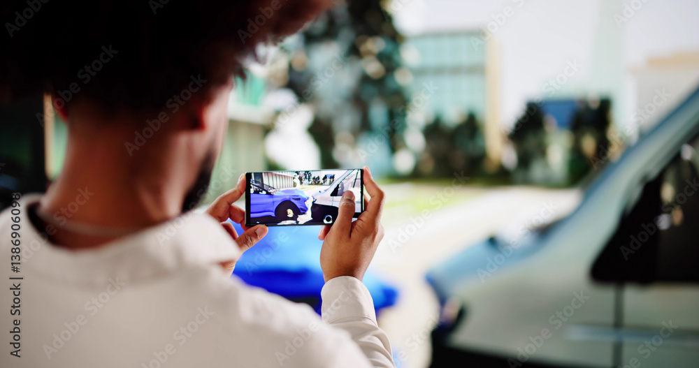 Insurance adjuster taking photos of car accident