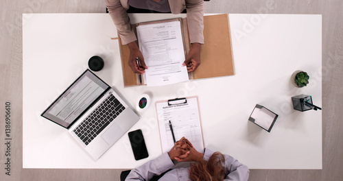 Obraz na płótnie Top Law Office Recruiter Reviewing Young Professional's Resume w salonie