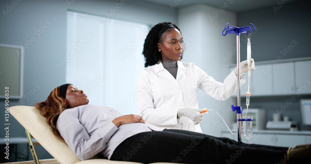 Medical Professional Administers Vitamin Drip Therapy