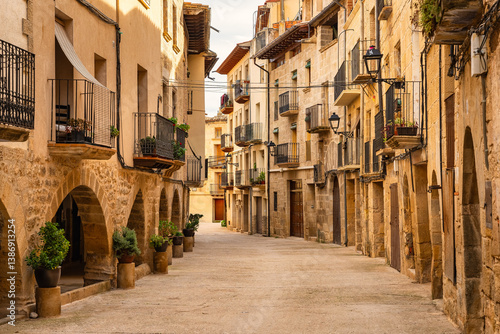 Picturesque streets with plants and arches in the medieval houses of the town of La Fresneda, Matarrana.