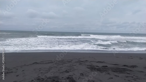 Tropical summer holiday travel to the blue sky ocean beach landscape with waves, sand, water, and clouds