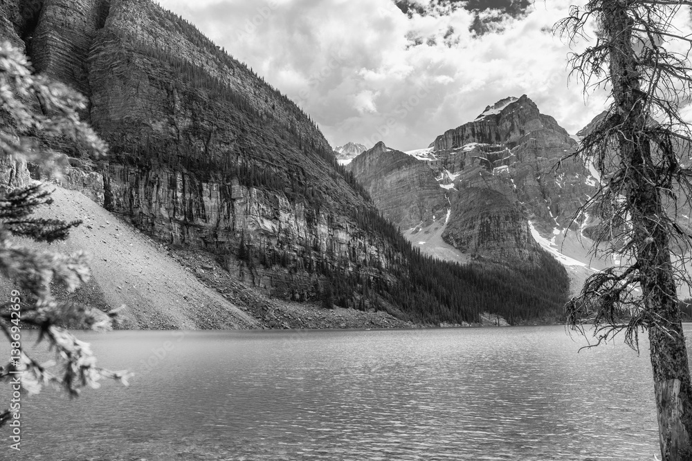 Tranquil Beauty - Reflective Waters of Lake Moraine Surrounded by Rocky Mountains