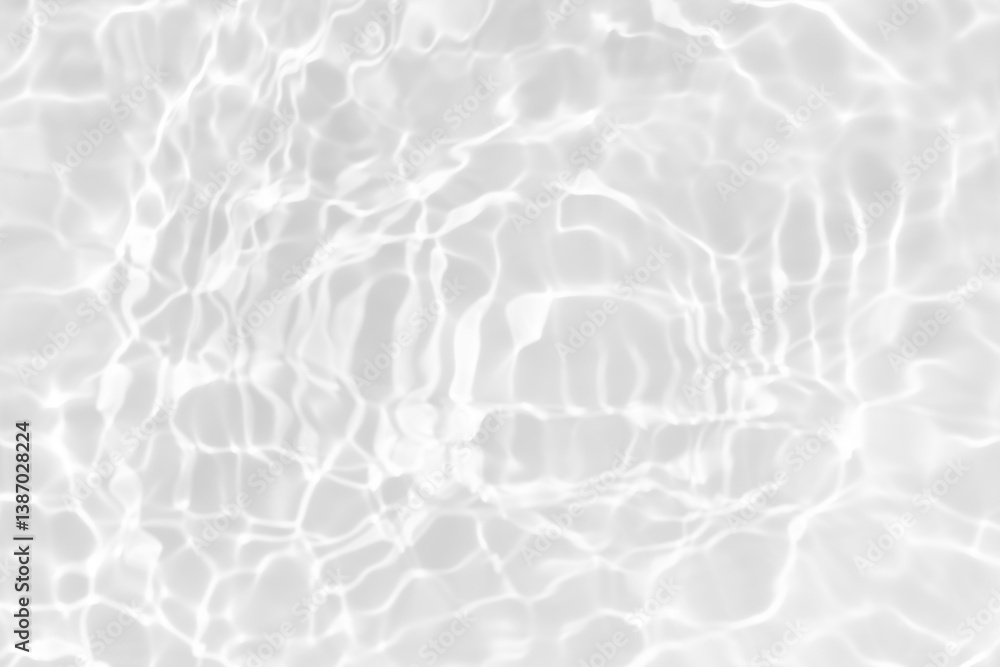 Obraz premium White water with ripples on the surface. Defocus blurred transparent white colored clear calm water surface texture with splashes and bubbles. Water waves with shining pattern texture background.