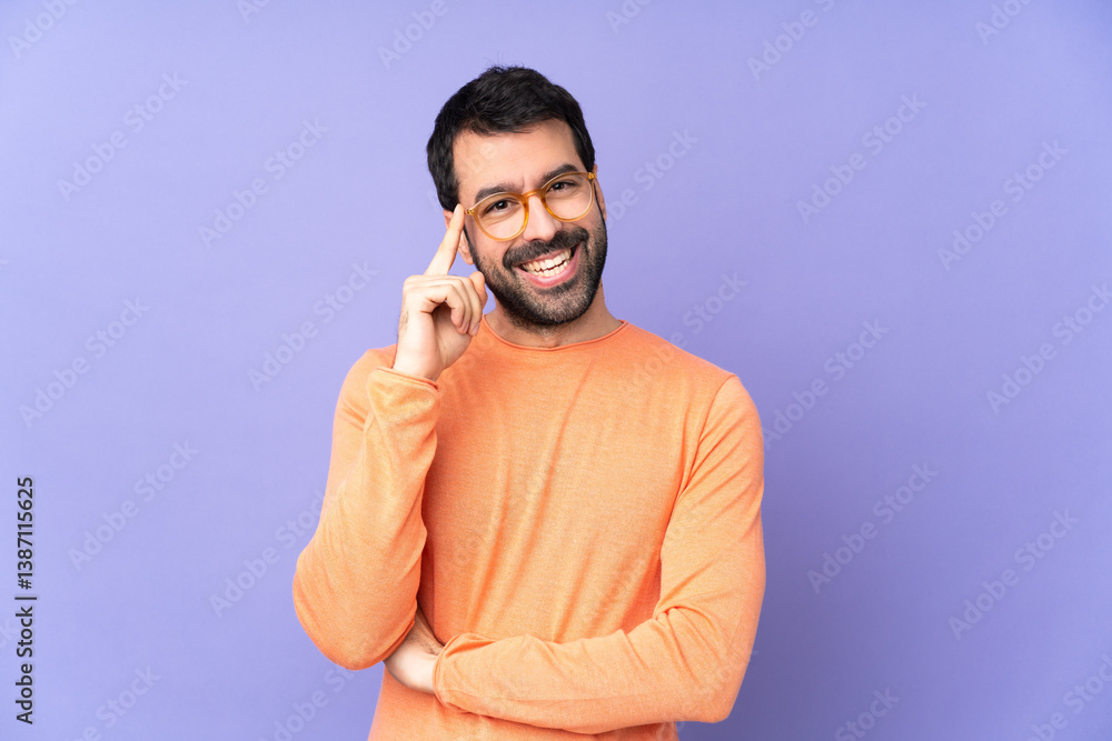 Caucasian handsome man over isolated purple background with glasses and happy Caucasian handsome man over isolated purple background with glasses and happy