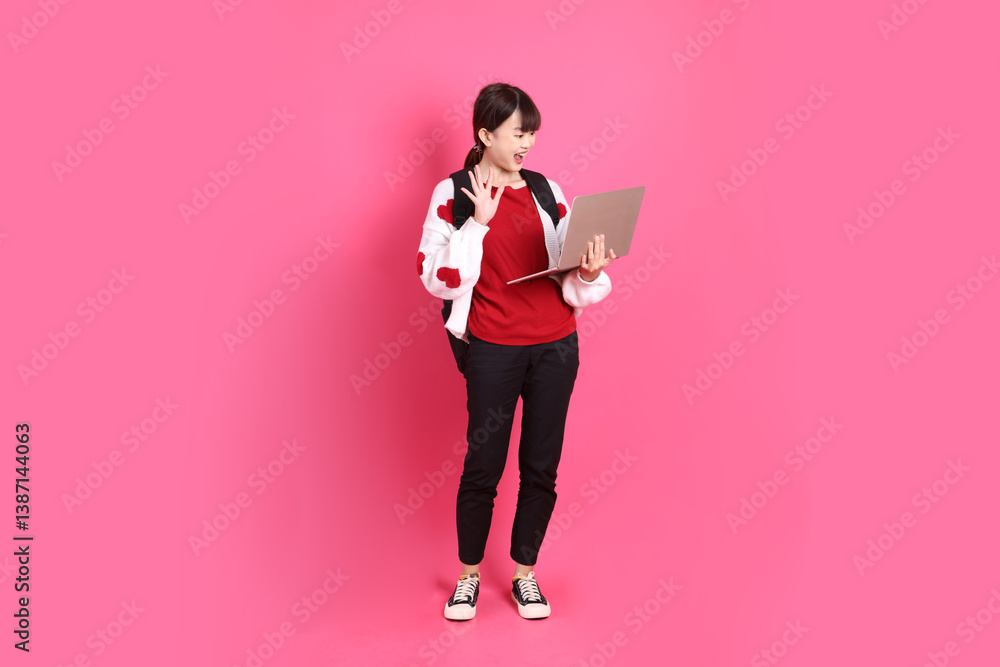 20s asian woman in red t-shirt 20s asian woman in red t-shirt