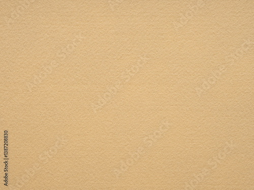 Obraz na płótnie The textured canvas of beige felt offers a visual symphony of warmth, blending simplicity with sophistication w salonie