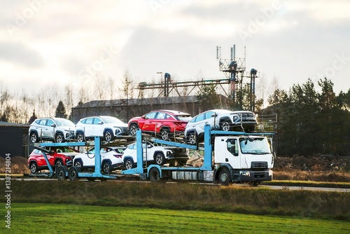 Obraz na płótnie Trailer with SUVs driving countryside road w salonie