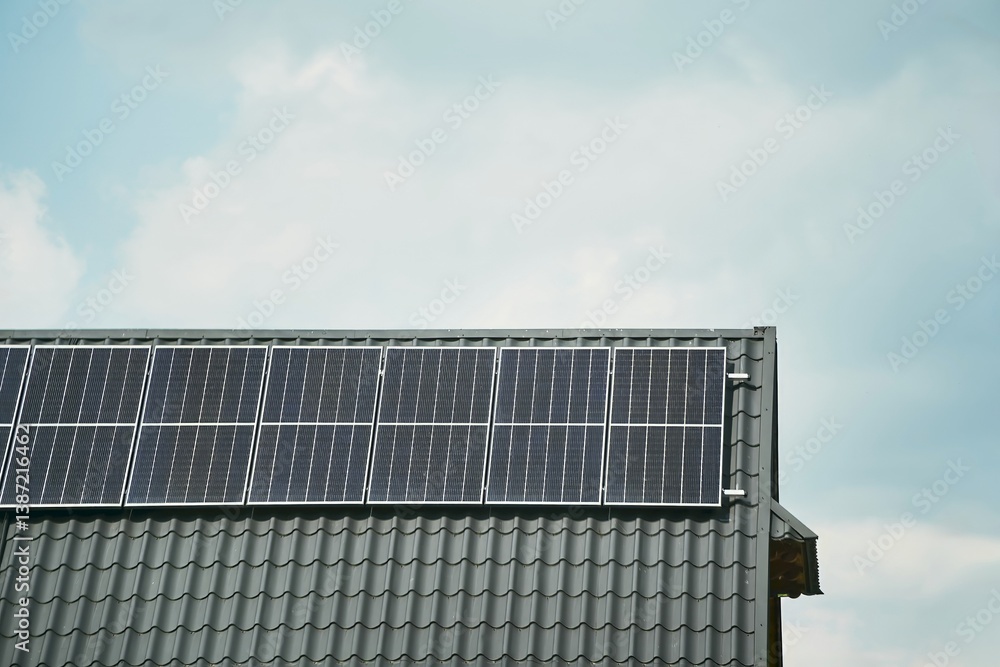 Clean energy solar panels on house roof
